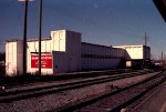 Brown Roger Dixon appliance warehouse across tracks from Seaboard Station